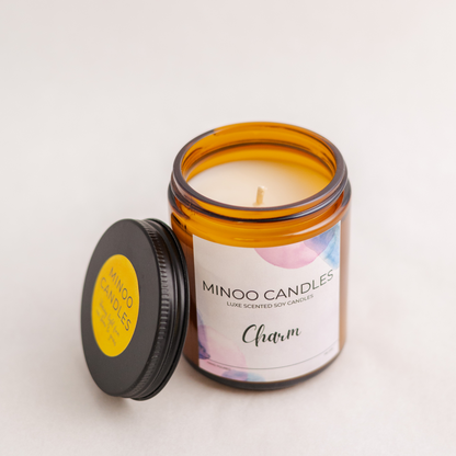 Handmade scented candle in jar with lid. Fragrance of freshness, powdery and woody and amber oakmoss. Bespoke candles of UAE at minoocandles dot com