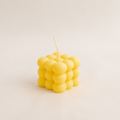 Medium bubble cube candle in yellow colour, handmade with soywax in UAE. Perfect for birthday or wedding favours, corporate gifts, order today at minoocandles dot com