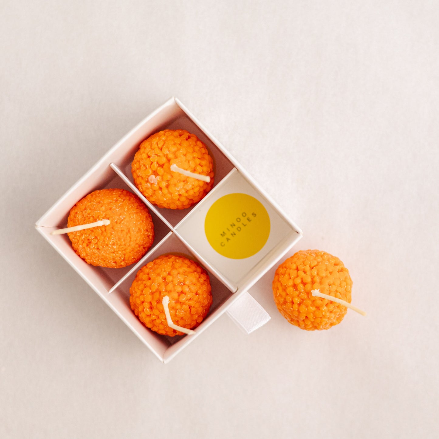 Handmade laddu candles orange with wick and wickless for wedding and mehendi in UAE. Discount for bulk orders