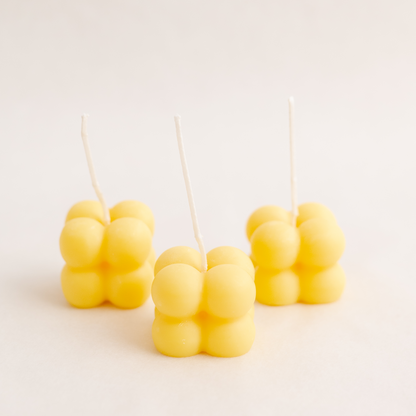 three small bubble cube candle in yellow colour, handmade with soywax in UAE. Perfect for birthday or wedding favours, corporate gifts, order today at minoocandles dot com