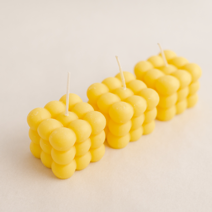 three medium bubble cube candle in yellow colour, handmade with soywax in UAE. Perfect for birthday or wedding favours, corporate gifts, order today at minoocandles dot com