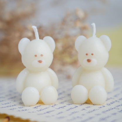 Handmade bear candle made of soy wax in colour ivory with a lead-free wick. Customization options available for decorative candles in UAE at minoocandles dot com