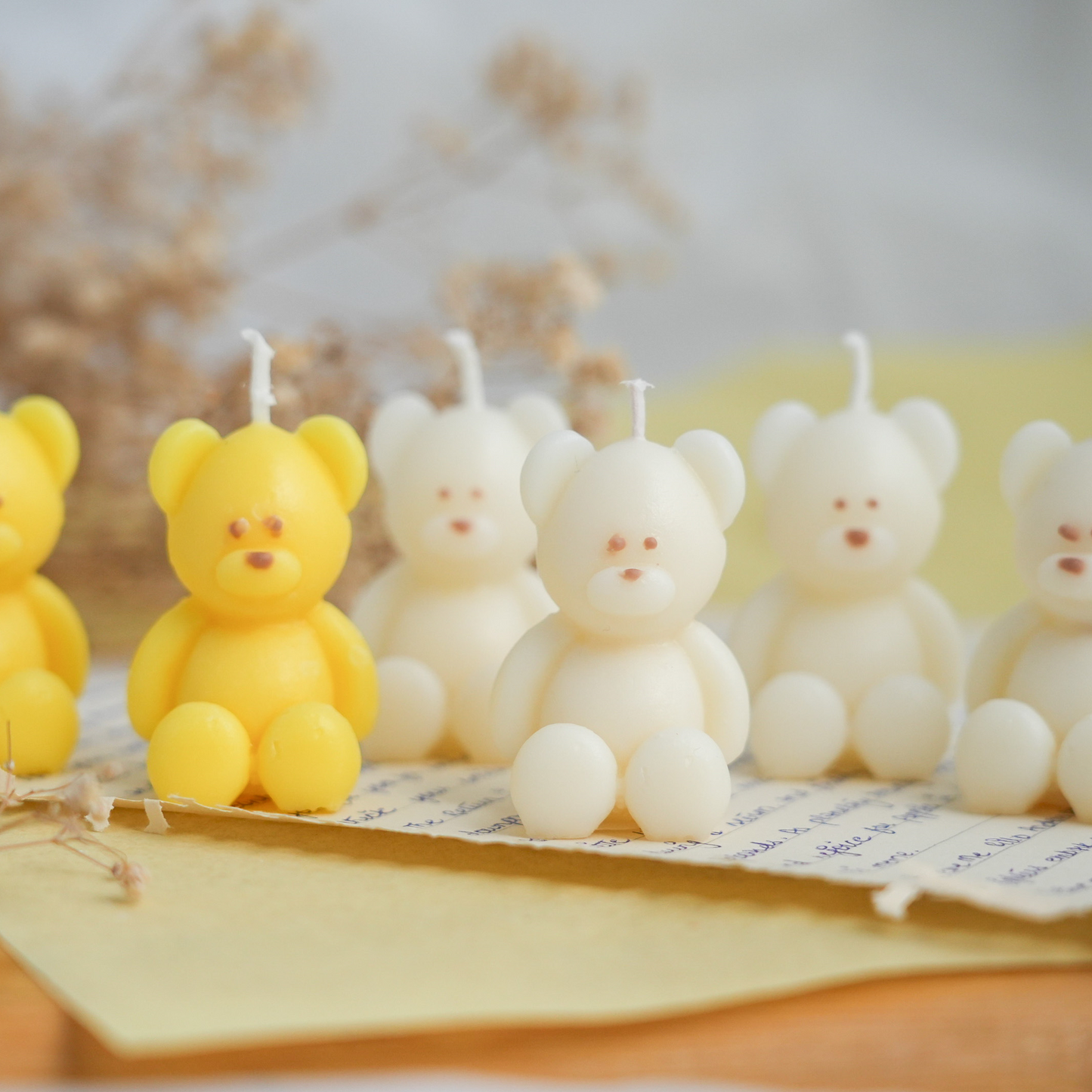 cute kawaii handmade bear candles made of soy wax in colour ivory with a lead-free wick. Customization options available for decorative candles in UAE at minoocandles dot com